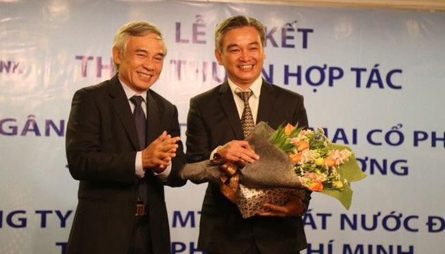 Ông Phạm Văn Thông (trái), nguyên Phó Chánh Văn phòng Thành ủy TP.HCM vừa bị khởi tố. 